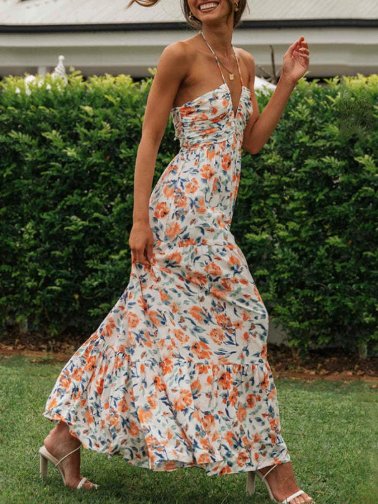 ผู้หญิงฤดูร้อนชีฟอง Halter V คอแขนกุดลายดอกไม้ Flowy ชุด Maxi Boho เปลือยฉัตร Swing Long Beach Dresses